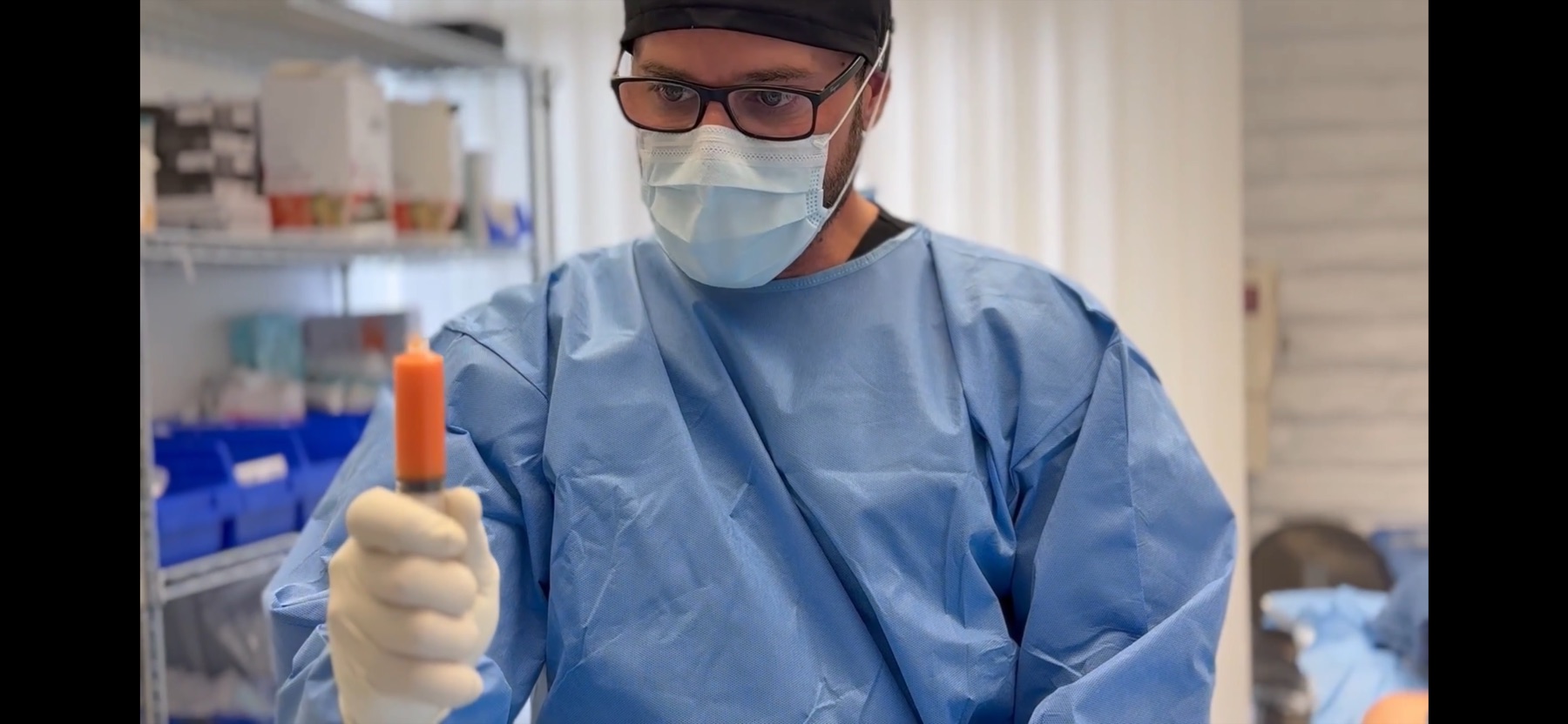Faisal Darwiche, NP in the operating room, mid-procedure